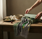 artistic boxing of a designer grey scarf